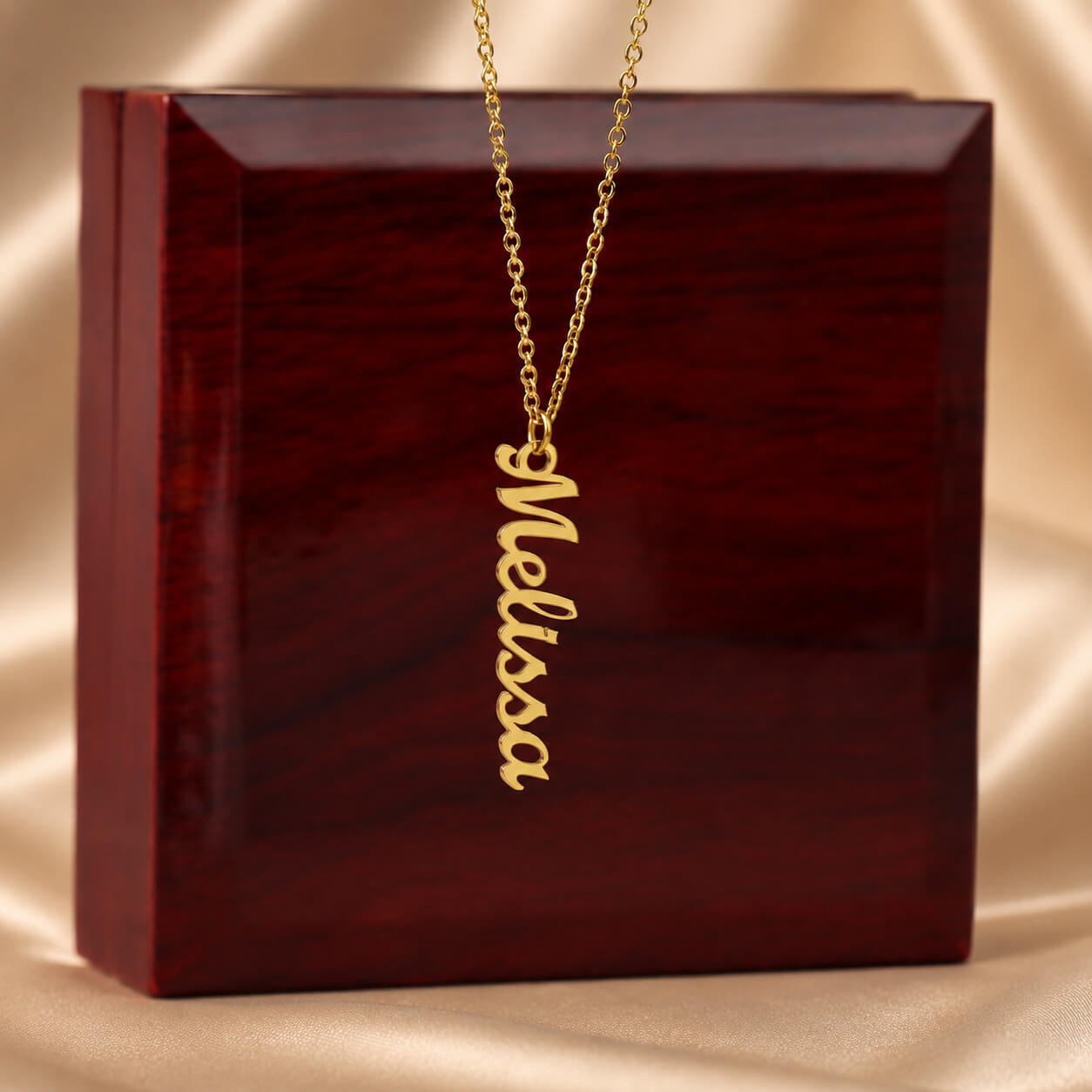 Personalized vertical name necklace in gold with luxury gift box