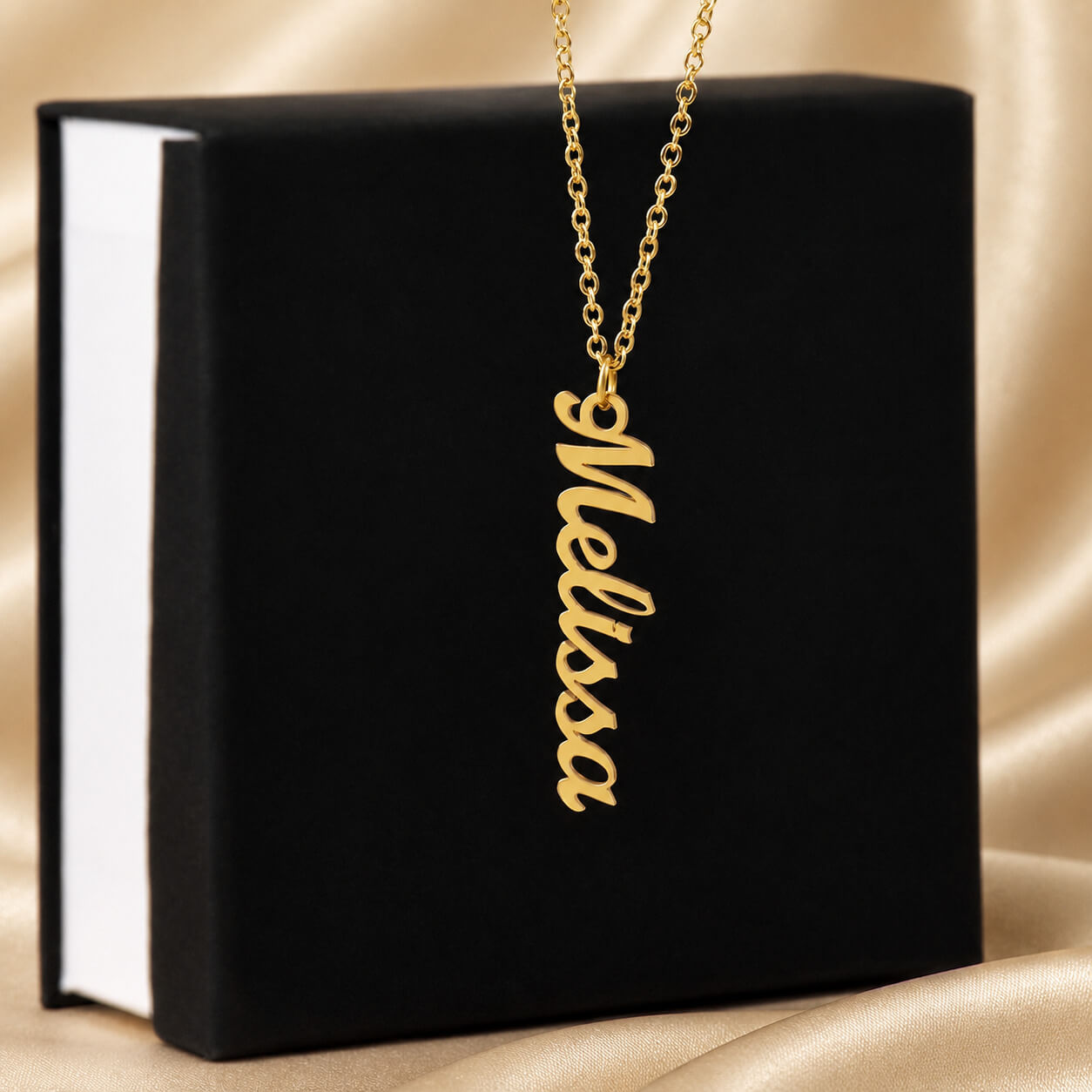Personalized vertical name necklace in gold with standard gift box